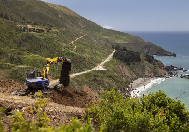 Crews work on top of Regent’s Slide above Highway 1 in Big Sur in 2024. The roadway is expected to reopen next March, barring further problems.