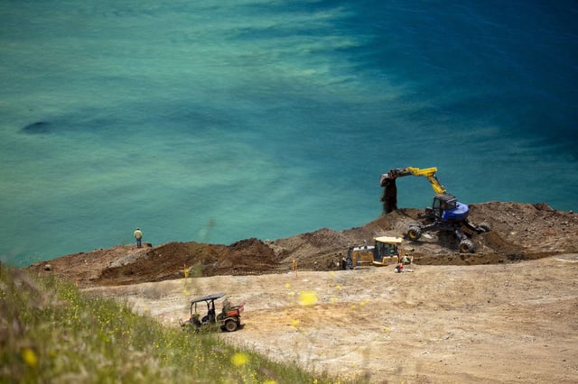 Crews work on top of Regent’s slide above Highway 1 in Big Sur in 2024.