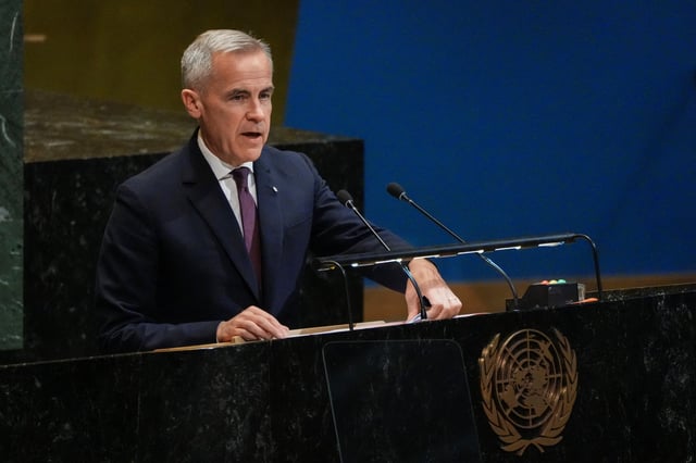 Canadian Prime Minister Mark Carney addresses delegates during a high-level meeting of heads of state on a two-state solution between Israel and the Palestinians at United Nations headquarters in New York City, U.S., September 22, 2025. REUTERS/Eduardo Munoz