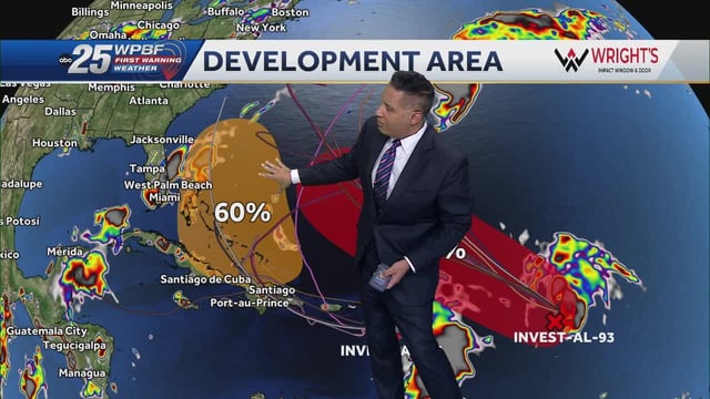 Two developing tropical waves to track
