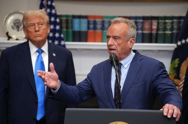 WASHINGTON, DC – SEPTEMBER 22: U.S. President Donald Trump (L) looks on as Health and Human Services Secretary Robert F. Kennedy Jr. (R) answers questions after delivering an announcement on “significant medical and scientific findings for America’s children” in the Roosevelt Room of the White House on September 22, 2025 in Washington, DC. Federal health officials suggested a link between the use of acetaminophen during pregnancy as a risk for autism, although many health agencies have noted inconclusive results in the research. 