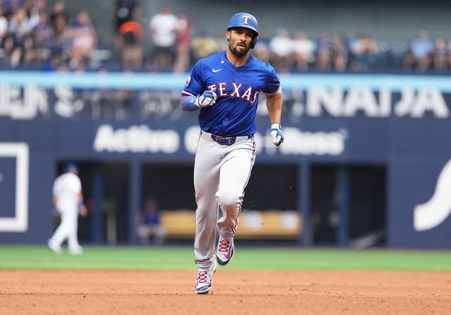 Aug 17, 2025; Toronto, Ontario, CAN; Texas Rangers second baseman Marcus Semien (2) runs the bases after hitting a two run home run against the Toronto Blue Jays during the second inning at Rogers Centre. Mandatory Credit: Nick Turchiaro-Imagn Images/File Photo
