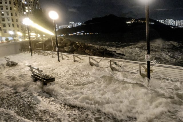 Waves crash into the Heng Fa Chuen residential district as Super Typhoon Ragasa approaches near Hong Kong on September 23, 2025.