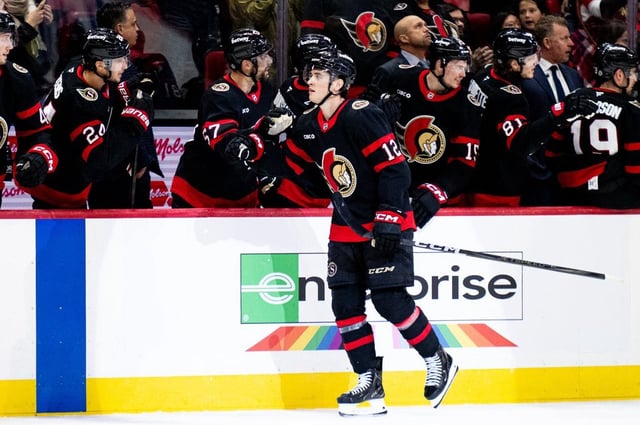 Ottawa Senators centre Shane Pinto (12) celebrates his goal with teammates on the bench during first period NHL hockey action against the Tampa Bay Lightning in Ottawa, on Thursday, April 3, 2025. THE CANADIAN PRESS/Spencer Colby