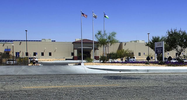 This May 19, 2015, file photo shows the Adelanto Detention Center in Adelanto, Calif., a desert community 70 miles (113 kilometers) northeast of Los Angeles. 