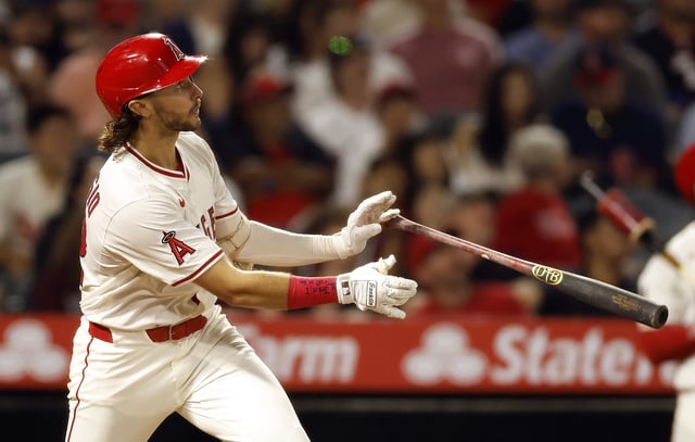The Angels’ Bryce Teodosio hits a two-run home run during the fifth inning of their game against the Kansas City Royals on Tuesday night at Angel Stadium. It was his first career major-league homer. (Photo by Ronald Martinez/Getty Images)
