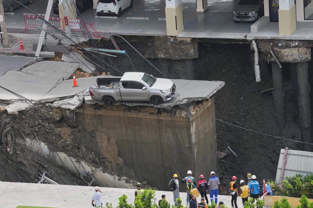Damage is seen after a road collapse near Vajira Hospital in Bangkok Thailand, Wednesday, Sept. 24, 2025. (AP Photo/Sakchai Lalit)