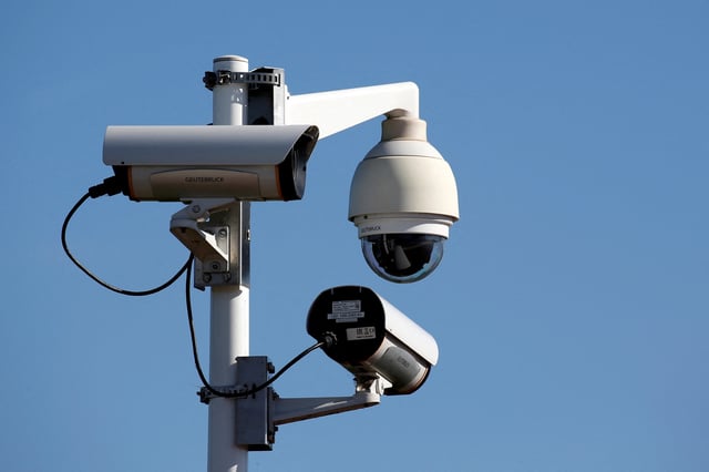 Security cameras are seen outside the final assembly line site at Airbus headquarters in Blagnac, near Toulouse, France, February 14, 2019. REUTERS/Regis Duvignau/File Photo