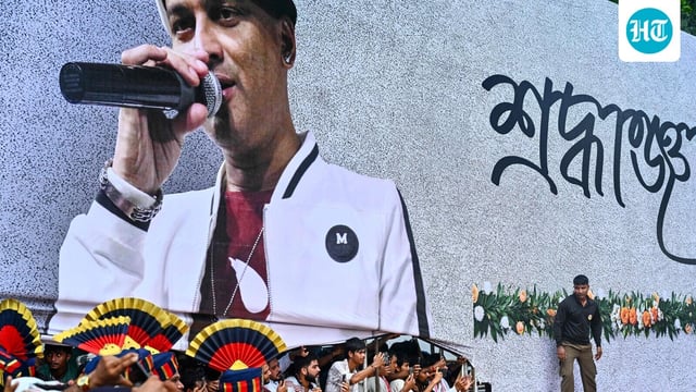 Fans throng during the cremation of musician Zubeen Garg, on the outskirts of Guwahati on September 23.