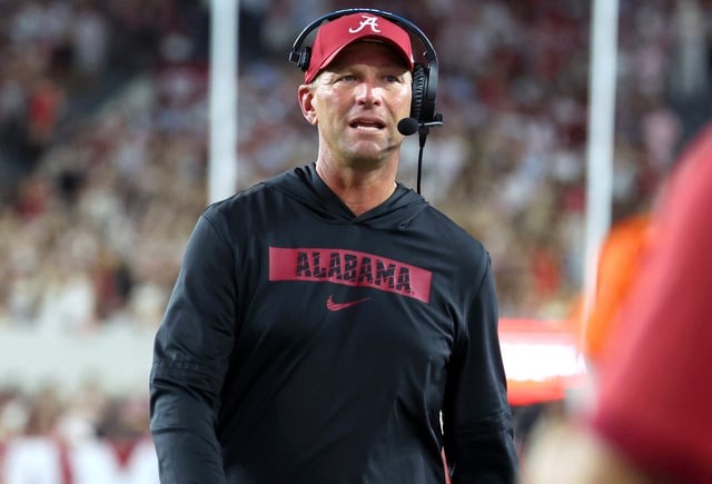 Alabama football coach Kalen DeBoer paces the sidelines during his team's game against Louisiana-Monroe at Saban Field at Bryant-Denny Stadium.