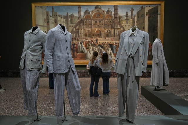 Giorgio Armani's creations are displayed during the exhibition "Giorgio Armani - 50 Years" opened to the public at the Pinacoteca di Brera in Milan, Italy, Wednesday, Sept. 24 2025. (AP Photo/Antonio Calanni)
