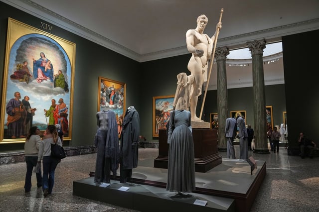Giorgio Armani's creations are displayed during the exhibition "Giorgio Armani - 50 Years" opened to the public at the Pinacoteca di Brera in Milan, Italy, Wednesday, Sept. 24 2025. (AP Photo/Antonio Calanni)