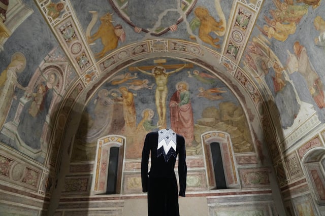 Giorgio Armani's creations are displayed during the exhibition "Giorgio Armani - 50 Years" opened to the public at the Pinacoteca di Brera in Milan, Italy, Wednesday, Sept. 24 2025. (AP Photo/Antonio Calanni)