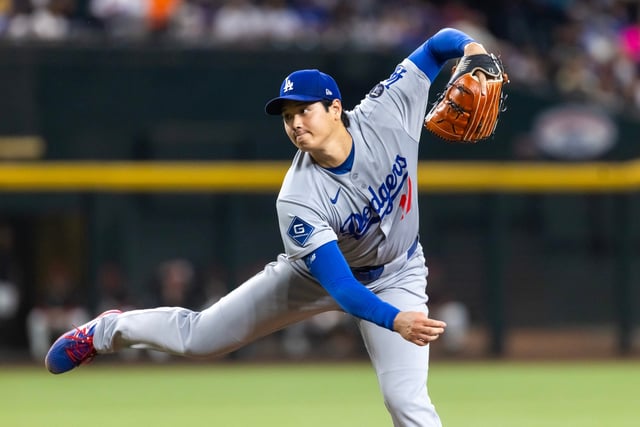 Los Angeles Dodgers pitcher Shohei Ohtani pitches in the first inning against the Arizona Diamondbacks at Chase Field.