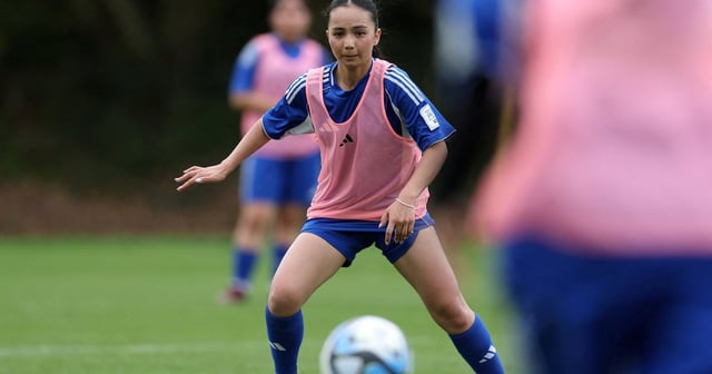 Najma Arefi of the Afghan Women's Refugee team in action during a selection camp at St George's Park, Burton upon Trent, Britain. Reuters