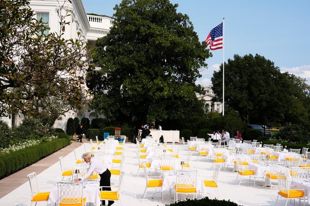 FILE - Workers prepare the Rose Garden for a dinner to be hosted by President Donald Trump, Sept. 5, 2025, in Washington. (AP Photo/Alex Brandon, File)