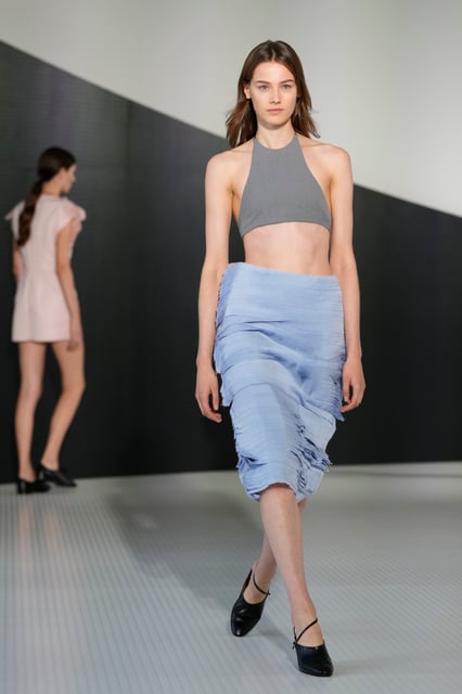 A model wears a creation part of the Jil Sander women's Spring-Summer 2026 collection, that was presented in Milan, Italy, Wednesday, Sept. 24, 2025. (AP Photo/Luca Bruno)
