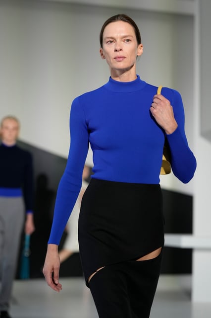 A model wears a creation part of the Jil Sander women's Spring-Summer 2026 collection, that was presented in Milan, Italy, Wednesday, Sept. 24, 2025. (AP Photo/Luca Bruno)