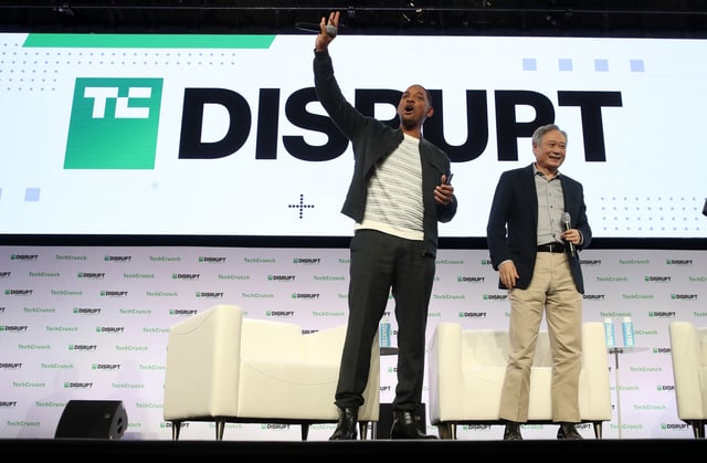 SAN FRANCISCO, CALIFORNIA - OCTOBER 02: Actor Will Smith (L) and director Ang Lee greet the audience during the TechCrunch Disrupt SF 2019 conference at Moscone Center on October 02, 2019 in San Francisco, California. TechCrunch Disrupt puts the spotlight on revolutionary startups and innovators. The three-day conference features interviews with industry leading entrepreneurs, investors and hackers. TechCrunch Disrupt SF runs through October 4. (Photo by Justin Sullivan/Getty Images)