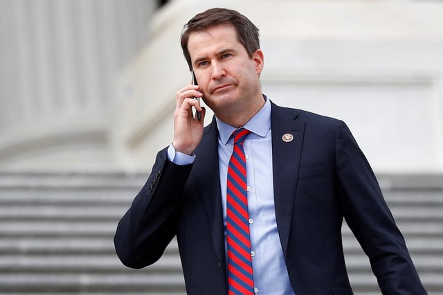Rep. Seth Moulton (D-MA) descends down the House entrance stairs following the Friends of Ireland reception on Capitol Hill in Washington, U.S., March 12, 2020. REUTERS/Tom Brenner/File Photo