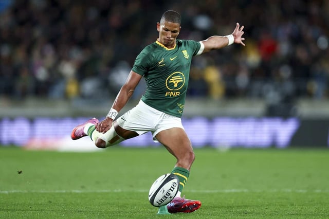 Manie Libbok nails five conversions and a penalty against the All Blacks in Wellington. Picture: Hagen Hopkins/Getty Images