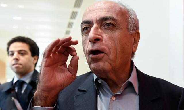 (FILES) Franco-Lebanese businessman Ziad Takieddine speaks to media as he arrives at Paris courthouse on October 7, 2019 on the first day of the trial for the financial aspect of "the Karachi case", an alleged arms deal kickbacks said to have funded the 1995 presidential campaign of Edouard Balladur. Takieddine, the main accuser of Nicolas Sarkozy in the investigation into alleged Libyan funding of his 2007 presidential campaign, died on the morning of September 23, 2025, in Beirut, his French lawyer Elise Arfi told AFP, confirming a report in Le Point magazine. (Photo by Bertrand GUAY / AFP)