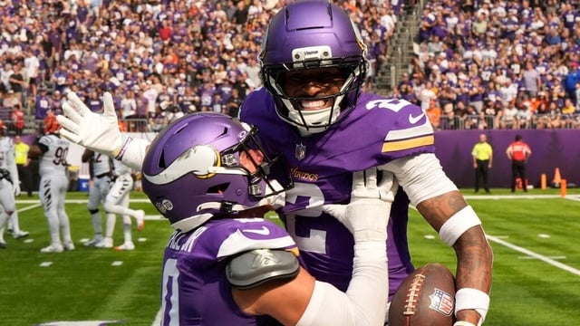 Minnesota Vikings cornerback Isaiah Rodgers (2) celebrates his touchdown with linebacker Ivan Pace Jr. during the first half of an NFL football game against the Cincinnati Bengals, Sunday, Sept. 21, 2025, in Minneapolis. (AP Photo/Mike Stewart)