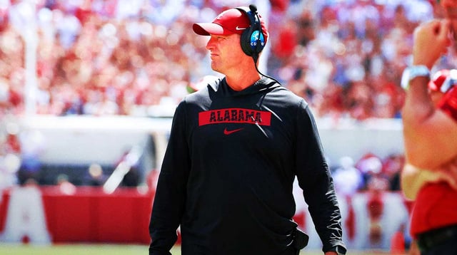Sep 13, 2025; Tuscaloosa, Alabama, USA; Alabama Crimson Tide head coach Kalen DeBoer surveys the field during the second half against the Wisconsin Badgers at Saban Field at Bryant-Denny Stadium. Mandatory Credit: David Leong-Imagn Images