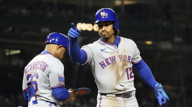 Sep 23, 2025; Chicago, Illinois, USA; New York Mets shortstop Francisco Lindor (12) reacts after hitting a one run single against the Chicago Cubs during the sixth inning at Wrigley Field. Mandatory Credit: David Banks-Imagn Images