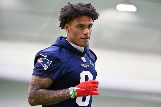 Jun 10, 2025; Foxborough, MA, USA; New England Patriots cornerback Christian Gonzalez (0) jogs to the sideline during minicamp held in the WIN Field House at Gillette Stadium. Mandatory Credit: Eric Canha-Imagn Images/File Photo