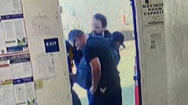 Screen shot of surveillance video shows a man being arrested by plainclothes ICE agents in San Jose. 