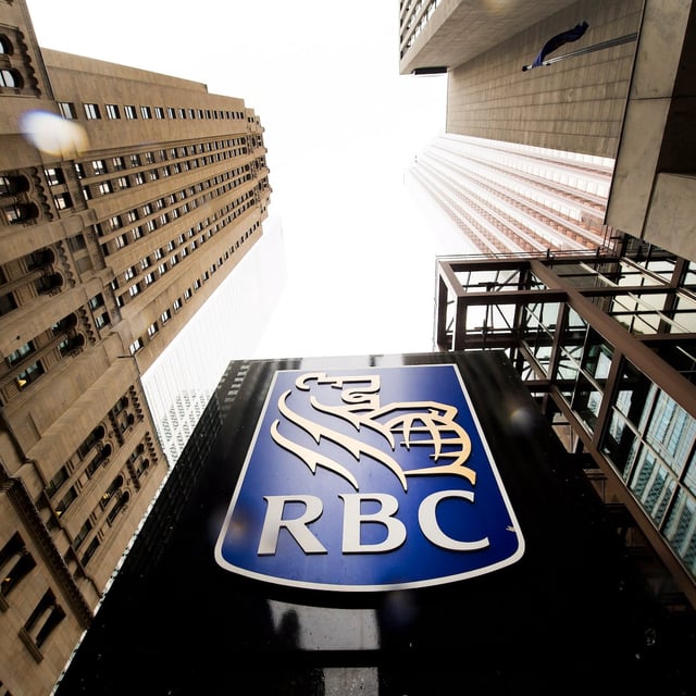 A Royal Bank of Canada sign is shown in the financial district in Toronto on Tuesday, August 22, 2017. Royal Bank of Canada raised its dividend as it reported a record $3.1 billion in net income for its third quarter, up 11 per cent from a year ago. THE CANADIAN PRESS/Nathan Denette