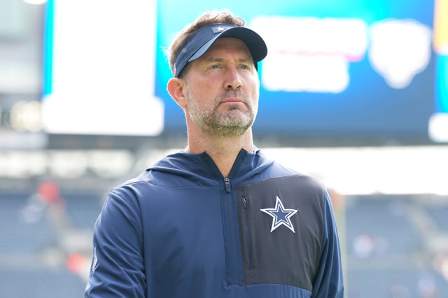 CHICAGO, ILLINOIS - SEPTEMBER 21:  Head coach Brian Schottenheimer of the Dallas Cowboys looks on prior to an NFL football game against the Chicago Bears at Solider Field on September 21, 2025 in Chicago, Illinois. (Photo by Todd Rosenberg/Getty Images)