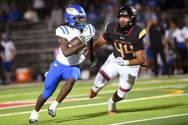 Jaion Smith (1) carries the ball for Santa Margarita as Oaks Christian’s Alifeleti Tuihalamaka (44) tries to tackle him during a game at Oaks Christian High School in Westlake Village on Friday, Sep. 12, 2025.(Photo by Andy Holzman, Contributing Photographer)