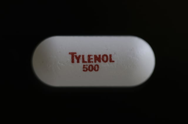SAN ANSELMO, CALIFORNIA - SEPTEMBER 22: In this photo illustration, a Tylenol caplet is displayed on September 22, 2025 in San Anselmo, California. The Trump administration will reportedly link use of the painkiller acetaminophen during pregnancy to autism during a White House press conference today. (Photo Illustration by Justin Sullivan/Getty Images)