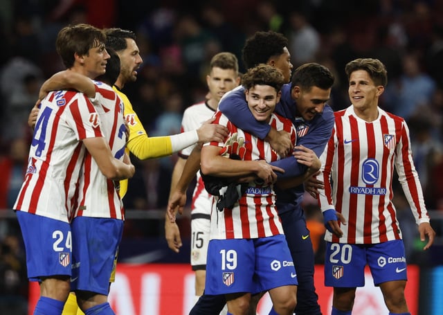 Soccer Football - LaLiga - Atletico Madrid v Rayo Vallecano - Riyadh Air Metropolitano, Madrid, Spain - September 24, 2025 Atletico Madrid's Julian Alvarez with teammates celebrate after the match REUTERS/Susana Vera