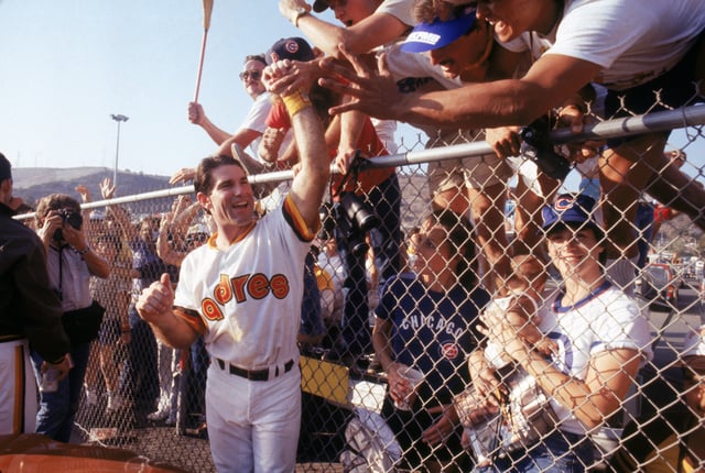 SAN DIEGO, CA – 1984:  Steve Garvey #6 of the San Diego Padres greets fans as the Padres host the Chicago Cubs for a 1984 National League Championship Series game at Jack Murphy Stadium in San Diego, California.  (Photo by Andrew D. Bernstein/Getty Images)
