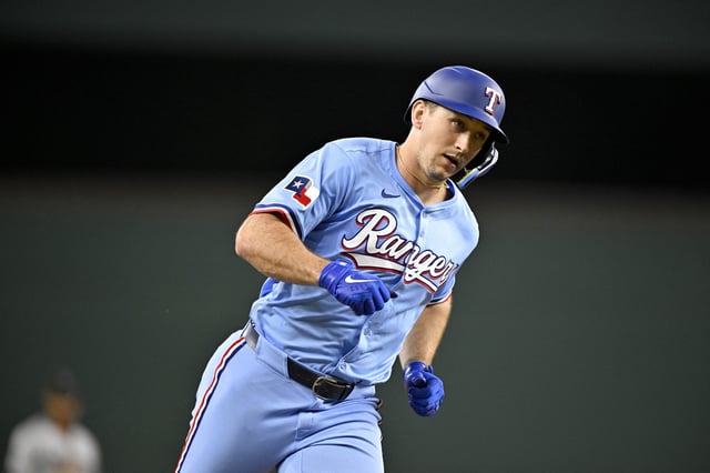 Sep 21, 2025; Arlington, Texas, USA; Texas Rangers left fielder Wyatt Langford (36) rounds the bases after he hits a home run against the Miami Marlins during the sixth inning at Globe Life Field. Mandatory Credit: Jerome Miron-Imagn Images/File Photo
