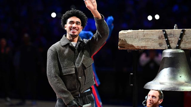 Jan 31, 2025; Philadelphia, Pennsylvania, USA; Philadelphia 76ers guard Jared McCain (20) reacts before the game against the Denver Nuggets at Wells Fargo Center. Mandatory Credit: Kyle Ross-Imagn Images