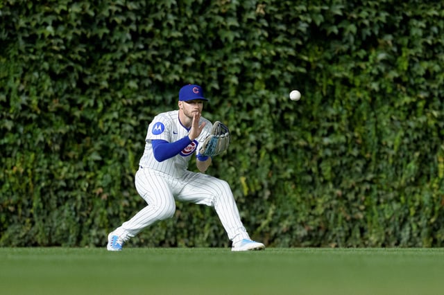 CHICAGO, ILLINOIS – SEPTEMBER 23: Ian Happ #8 of the Chicago Cubs makes a catch in a game against the New York Mets at Wrigley Field on September 23, 2025 in Chicago, Illinois. (Photo by Matt Dirksen/Chicago Cubs/Getty Images)

