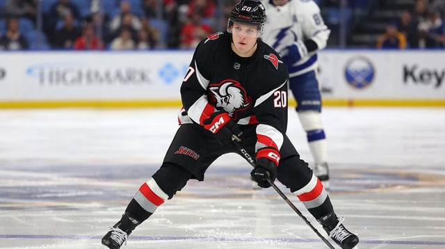 Apr 5, 2025; Buffalo, New York, USA; Buffalo Sabres center Jiri Kulich (20) looks to make a pass during the second period against the Tampa Bay Lightning at KeyBank Center. Mandatory Credit: Timothy T. Ludwig-Imagn Images
