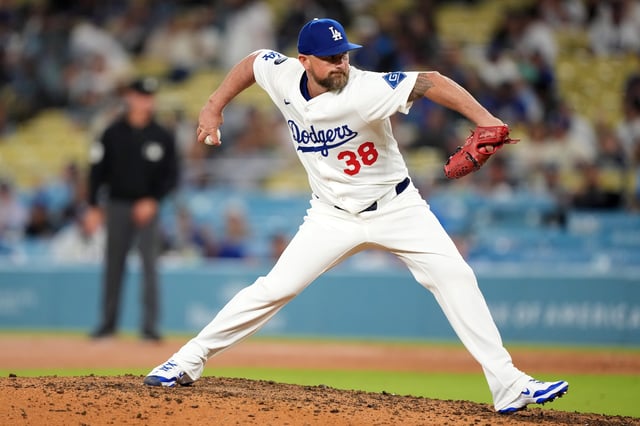 Sep 9, 2025; Los Angeles, California, USA;  Los Angeles Dodgers relief pitcher Kirby Yates (38) throws in the ninth inning against the Colorado Rockies at Dodger Stadium. Mandatory Credit: Kirby Lee-Imagn Images/File Photo