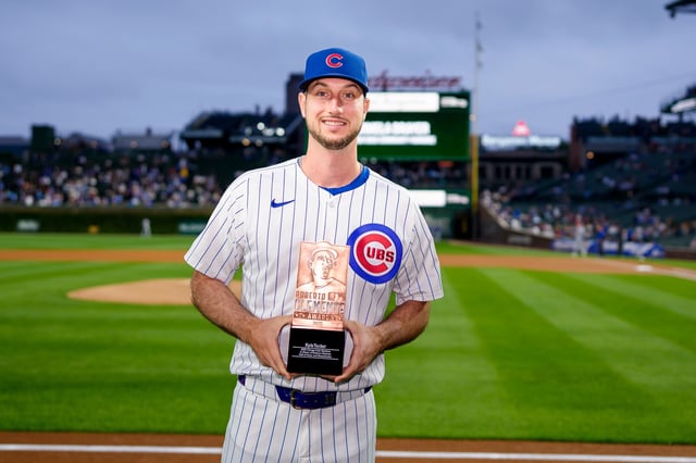 CHICAGO, ILLINOIS - SEPTEMBER 23: Kyle Tucker #30 of the Chicago Cubs poses for a photo after receiving the Cubs nomination for the 2025 Roberto Clemente Award before a game against the New York Mets at Wrigley Field on September 23, 2025 in Chicago, Illinois. (Photo by Matt Dirksen/Chicago Cubs/Getty Images)