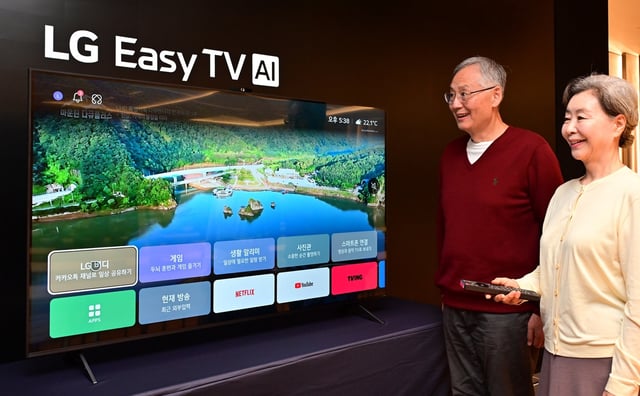 Models pose for a photo with the LG Easy TV, in this photo released by LG Electronics Inc. on Sept. 25, 2025. (PHOTO NOT FOR SALE) (Yonhap)