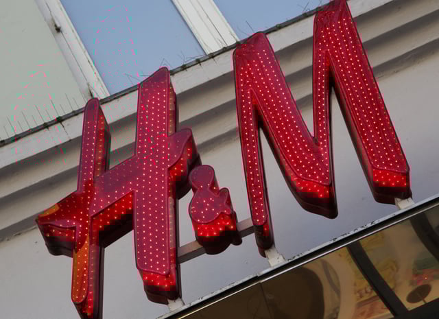 A view of the logo of fashion retailer H&M on one of its branches in Copenhagen, Denmark, March 26, 2024. REUTERS/Tom Little