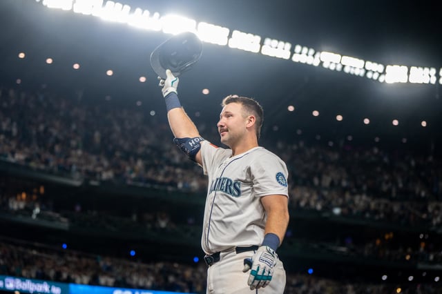 Sep 24, 2025; Seattle, Washington, USA; Seattle Mariners catcher Cal Raleigh (29) acknowledges the crowd after hitting his 60th home run of the season during the eighth inning against the Colorado Rockies at T-Mobile Park. Mandatory Credit: Stephen Brashear-Imagn Images