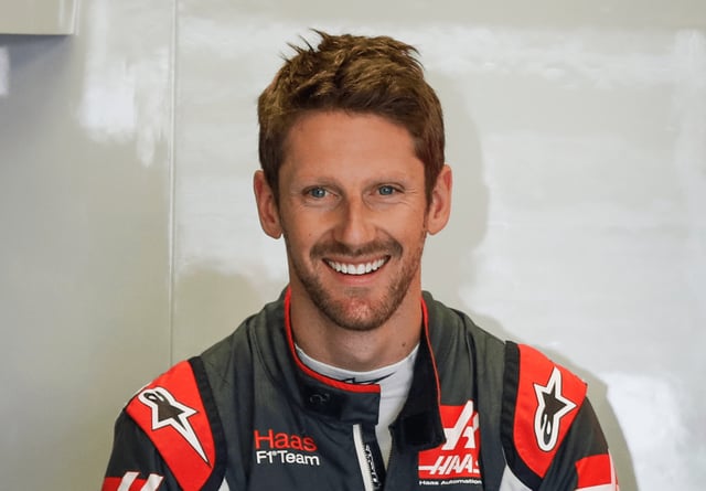 Romain Grosjean smiling in his Haas F1 race suit