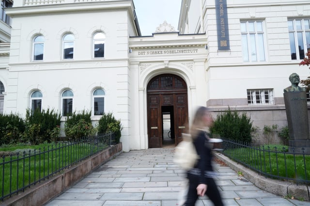 A pedestrian walks past the Norwegian Nobel Institute in Oslo, Norway, September 9, 2025. REUTERS/Tom Little