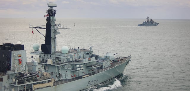 HMS Iron Duke shadowing the Russian warship