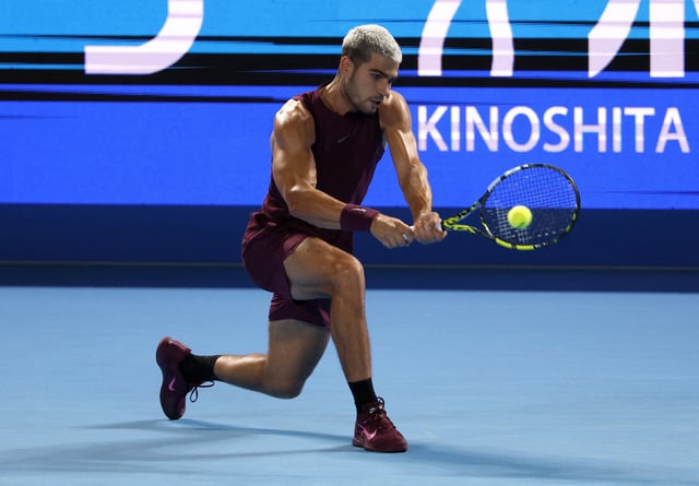Tennis - ATP 500 - Japan Open Tennis Championships - Ariake Colosseum, Tokyo, Japan - September  25, 2025 Spain's Carlos Alcaraz in action during his round of 32 match against Argentina's Sebastian Baez REUTERS/Manami Yamada